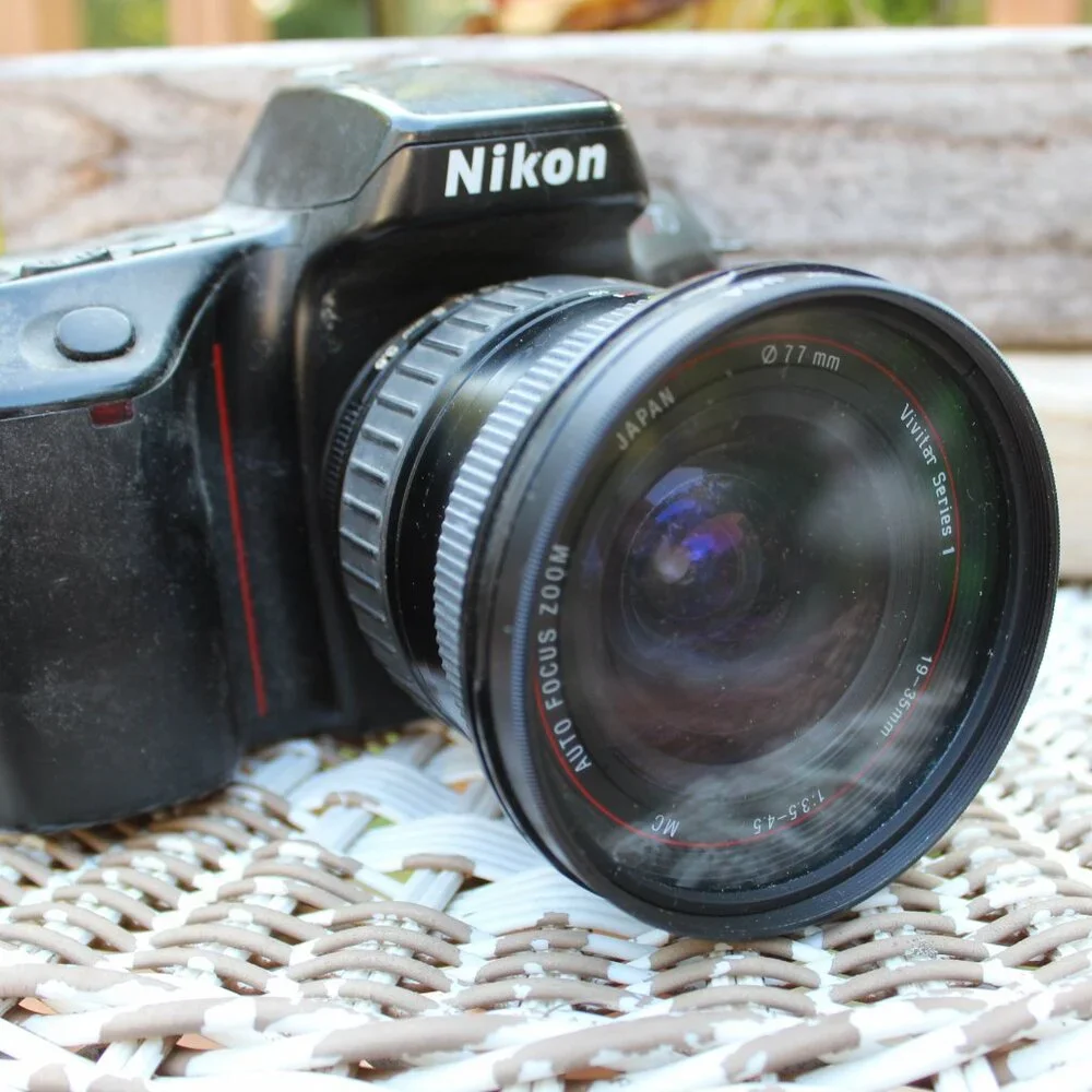 Nikon camera with fisheye lens (no battery) circa 1997